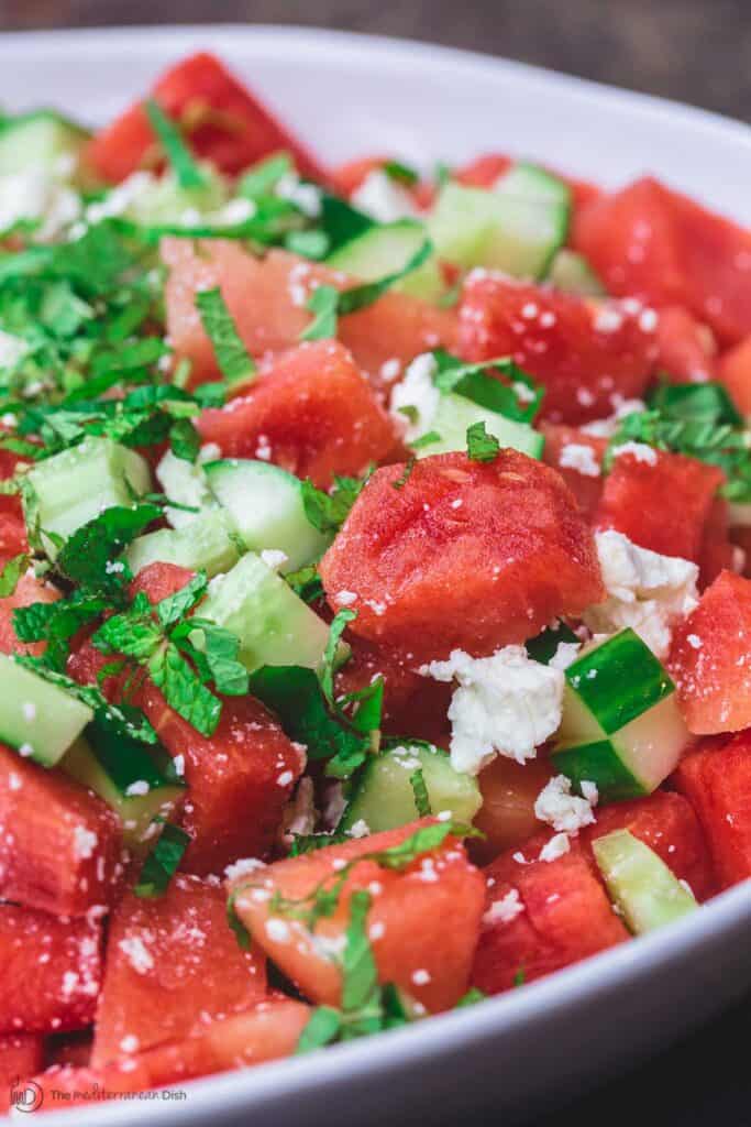 Mediterranean Watermelon Salad with Cucumber, Feta, Fresh Herbs and a Honey-Lime Dressing