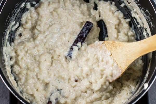 Rice, sugar and water added to the pot of ingredients