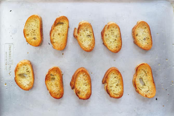 Slices of bread browned under broiler