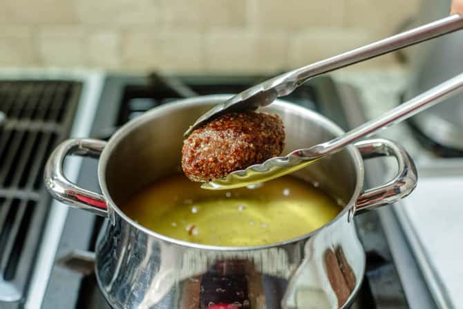 Fried Kibbeh removed from oil after frying