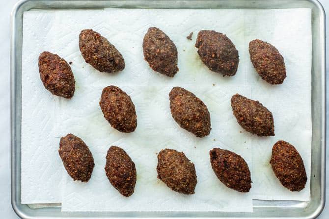 Fried Kibbeh returned to baking sheet to drain and settle