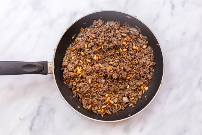 Ingredients of Kibbeh filling added to a pan