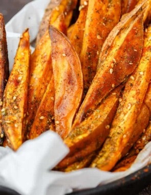 Baked Sweet Potato Fries with Za'atar | The Mediterranean Dish. Easy sweet potato fries recipe that is every bit as healthy, but tastes so indulgent! Wedges of sweet potatoes tossed in olive oil and Mediterranean spices including za'atar. A must try from TheMediterraneanDish.com