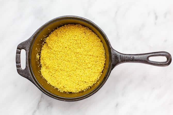 Pot containing yellow couscous.