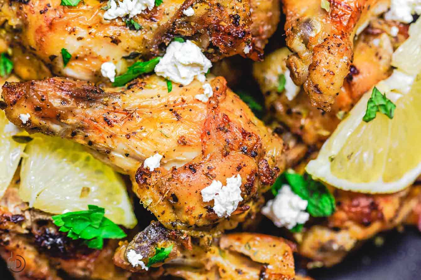 Baked wings sprinkled with feta