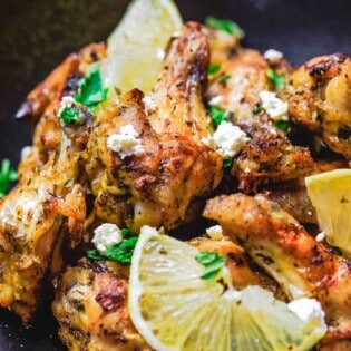 Greek Chicken Wings Recipe | The Mediterranean Dish. These chicken wings are the BEST! Easy, flavor-packed baked chicken wings that have been marinated Greek-style with olive oil, lemon juice, garlic and more! Get the recipe on TheMediterraneanDish.com