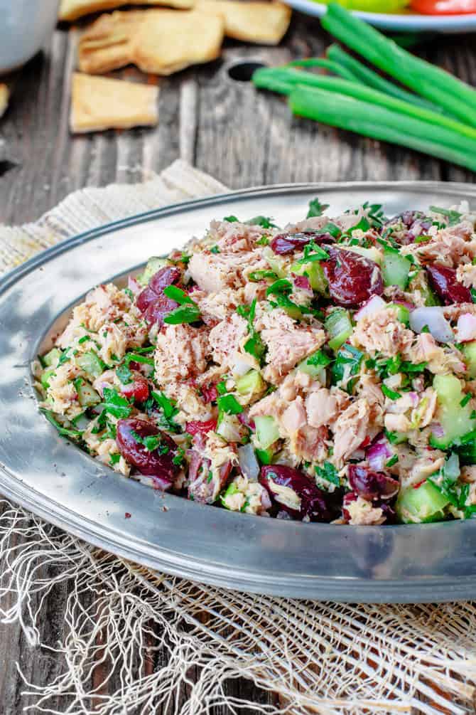 Top Mediterranean Recipe of 2016 | The Mediterranean Dish. Easy Mediterranean Tuna Salad with lots of chopped veggies, olives, and a special Mediterranean dressing! See this recipe and all 10 healthy Mediterranean recipes on TheMediterraneanDish.com