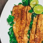 Mediterranean Pan Seared Trout Recipe with Tzatziki Sauce | The Mediterranean Dish. My favorite way to eat trout fillet ever! First the trout fillets are spiced Mediterranean-style, then simply seared in olive oil and a hint of butter. Served with a simple arugula salad and Greek Tzatziki sauce. See the recipe on TheMediterraneanDish.com