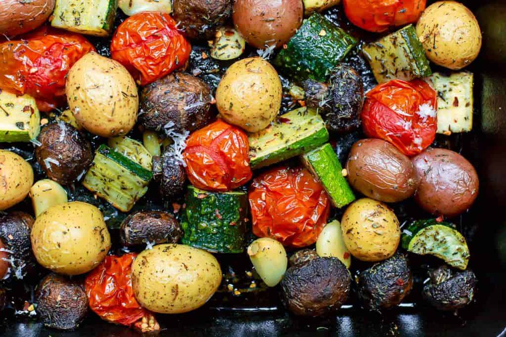 Italian Oven Roasted Vegetables | The Mediterranean Dish. Simple and delicious oven roasted vegetables, the Italian way! Not your average side dish! These veggies will be your new favorite! Comes together in 20 mins or so. See the recipe on TheMediterraneanDish.com