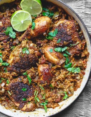 Spanish Chicken and Rice Recipe with Chorizo | The Mediterranean Dish. A simpler version of Arroz con Pollo, this Spanish chicken and rice recipe with chorizo is every bit a satisfying and flavorful, one-pan-wonder! See the recipe on TheMediterraneanDish.com