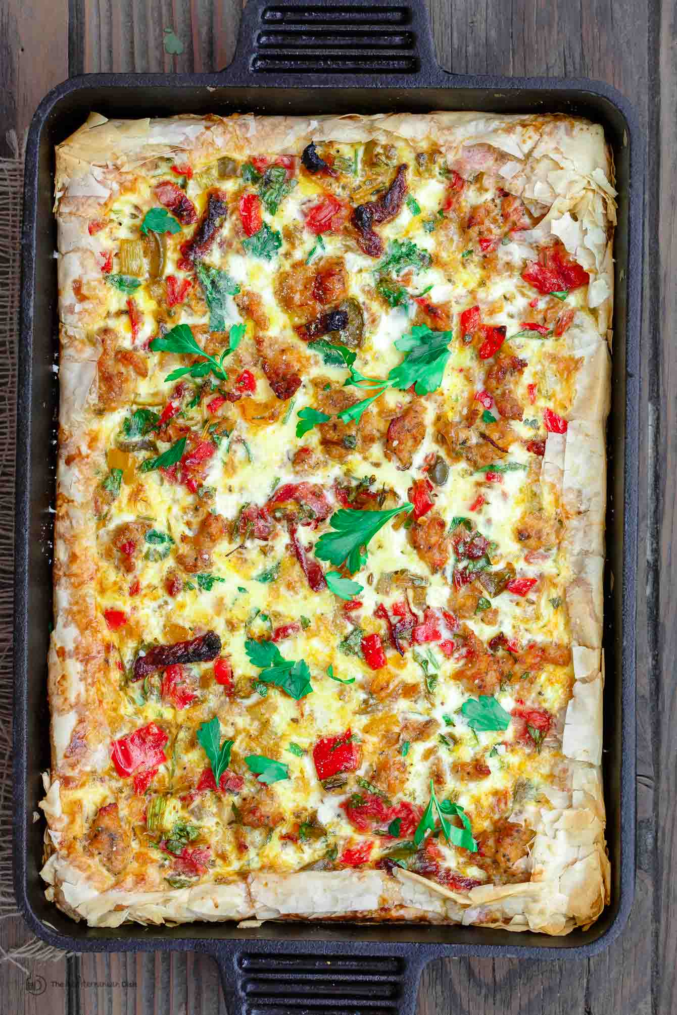 Baked Breakfast Strata ready to be cut and served