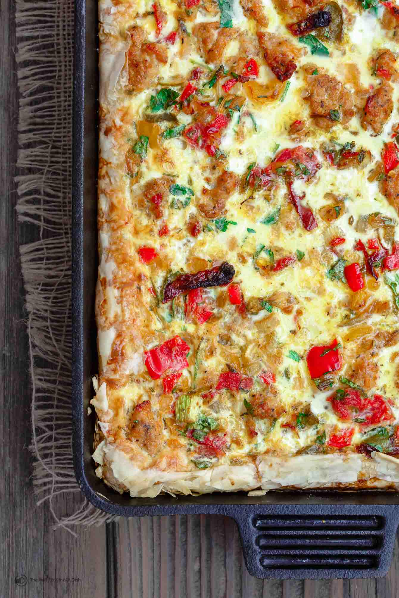 Close-up of baked strata with golden crust