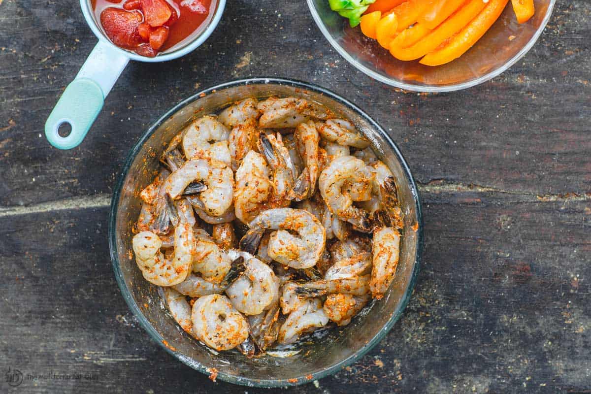 Peeled, deviened shrimp tossed in a little flour and spices to coat