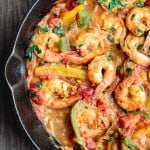 Mediterranean easy shrimp with bell peppers and shallots in skillet