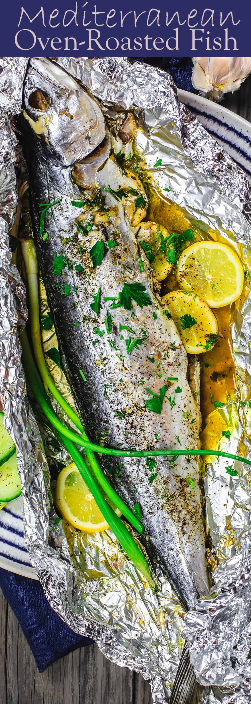 Mediterranean Oven Baked Spanish Mackerel Recipe | The Mediterranean Dish. Easy Greek inspired fish recipe. Whole fish stuffed with garlic, herbs, and lemon slices and oven baked in a foil packet with olive oil. A delicious Mediterranean diet recipe. See it on TheMediterraneanDish.com
