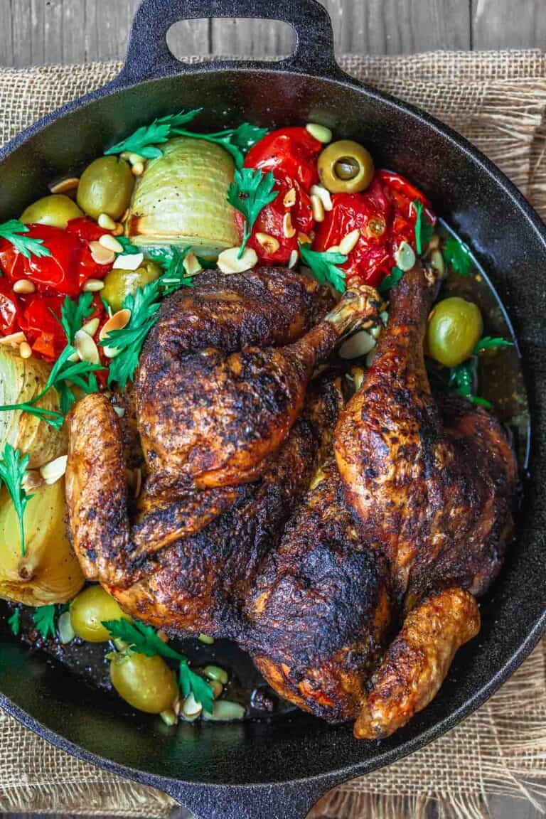 Crispy Spatchcocked Chicken Recipe | The Mediterranean Dish. The crispiest roast chicken you'll ever have! A couple of simple tricks, and a few favorite Mediterranean spices, take this spatchcoked roasted chicken to a whole new level of delicious! This will be your go-to chicken dinner. Full recipe on TheMediterraneanDish.com