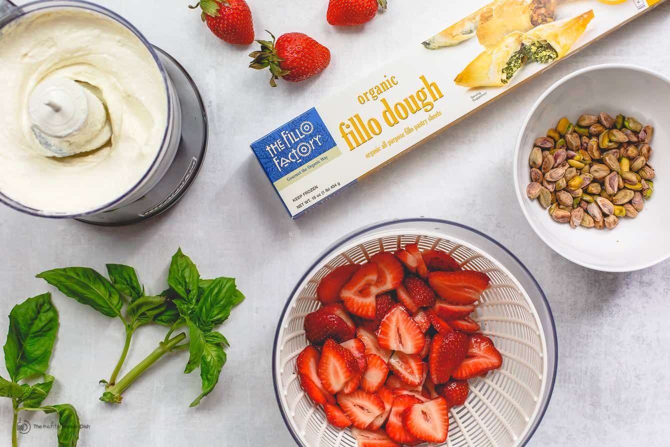 Ingredients for Feta Strawberry Tart with Fillo Crust laid out on table