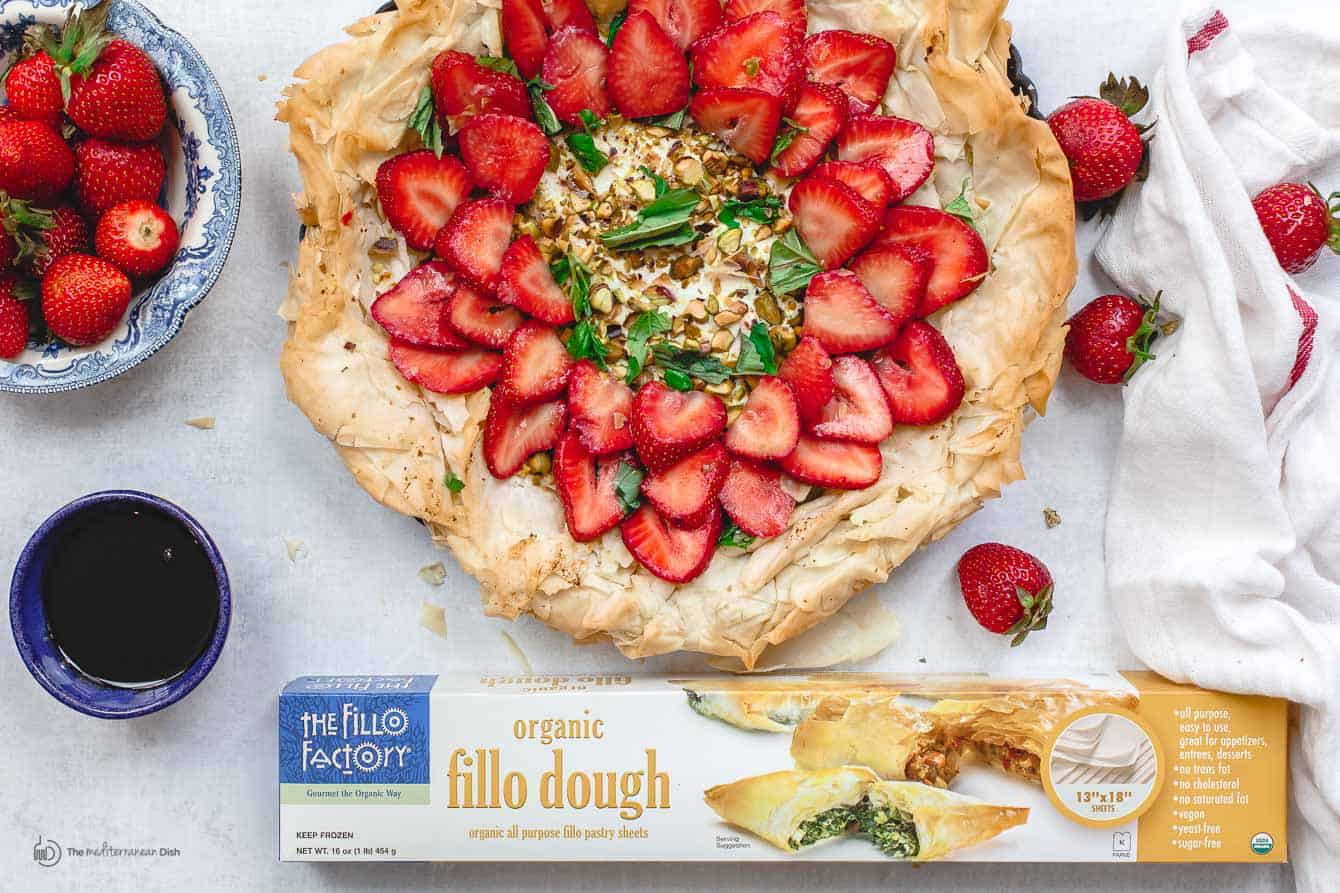 Sliced strawberries and rest of ingredients added to baked crust