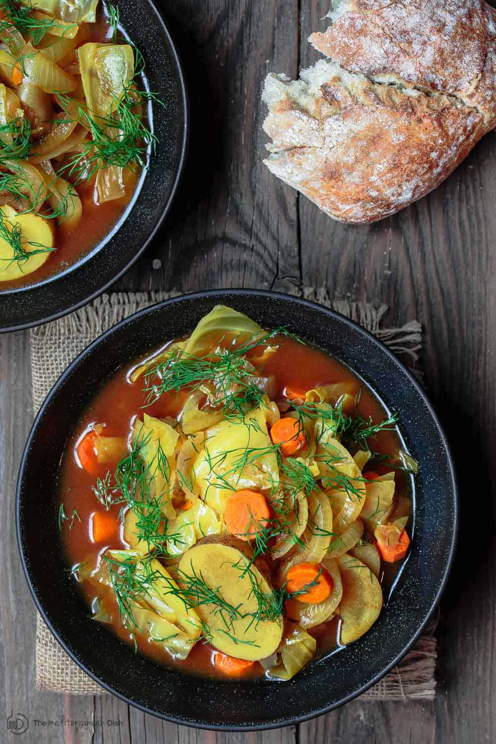 Vegan cabbage soup with a side of crusty bread