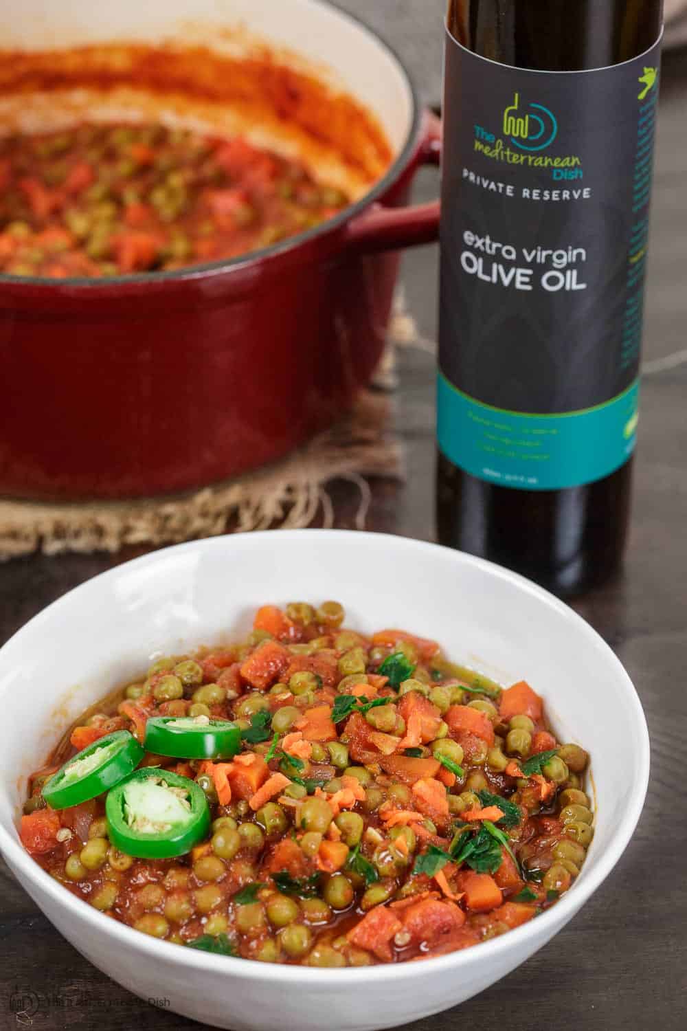 Stew served with bottle of extra virgin olive oil on the side for drizzling