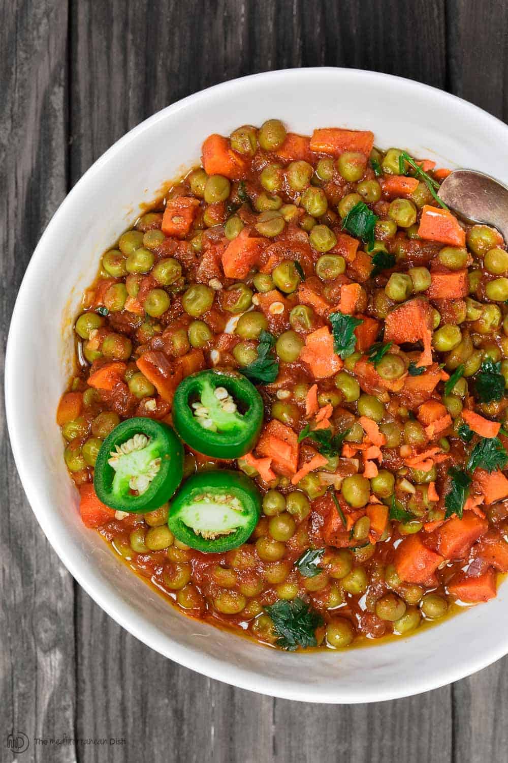 A bowl of vegan peas and carrots stew