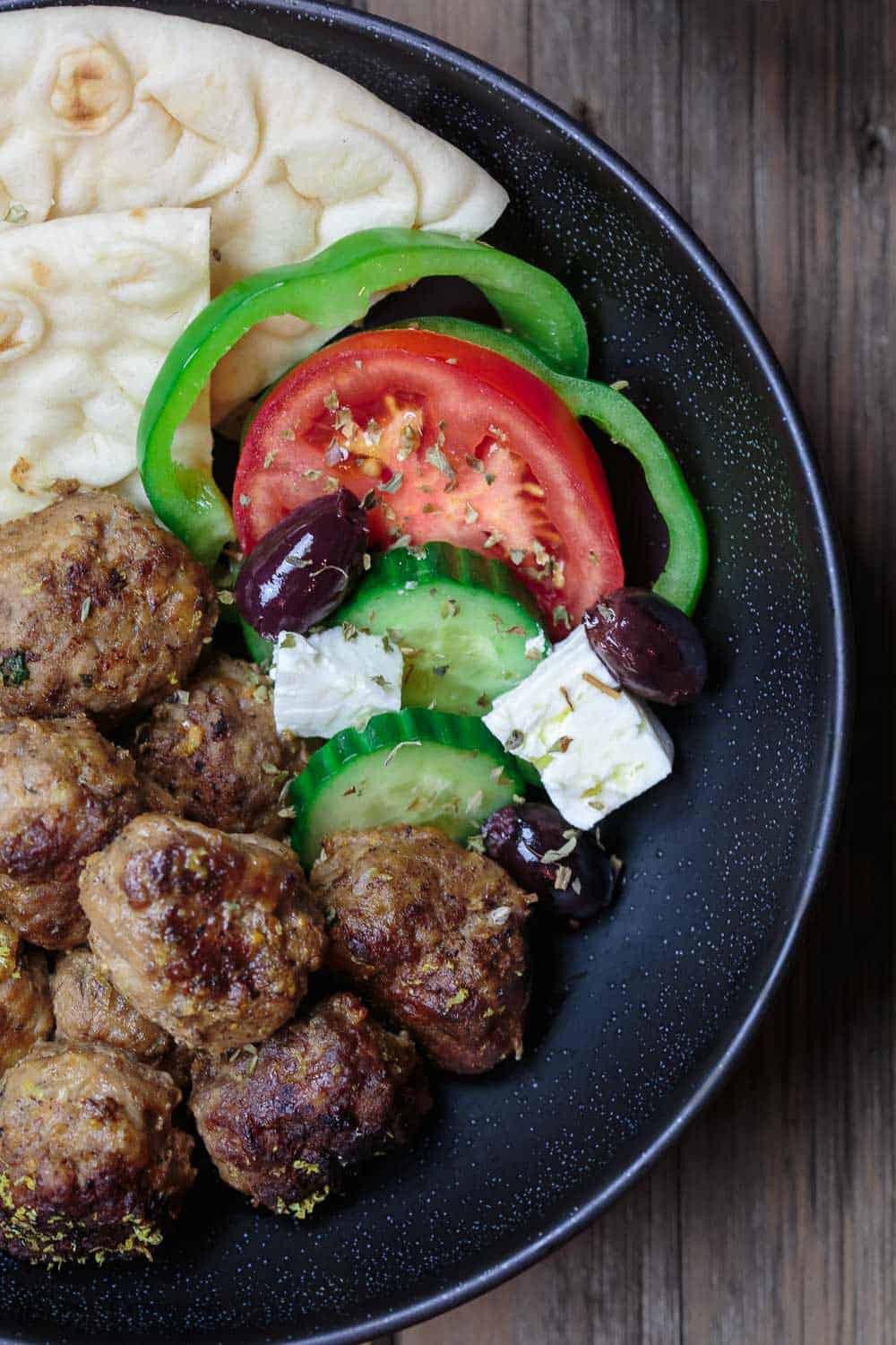 Keftedes Greek Meatballs Recipe | The Mediterranean Dish. Best Greek meatballs ever! Spiced with fresh mint, oregano and more, pan-fried in olive oil then finished with a thick lemony sauce. Serve it with pita and Greek salad and you've got an amazing Greek dinner! See the easy recipe on TheMediterraneanDish.com #greekmeatballs #meatballs #meatballrecipe #greekfood #greekrecipe 