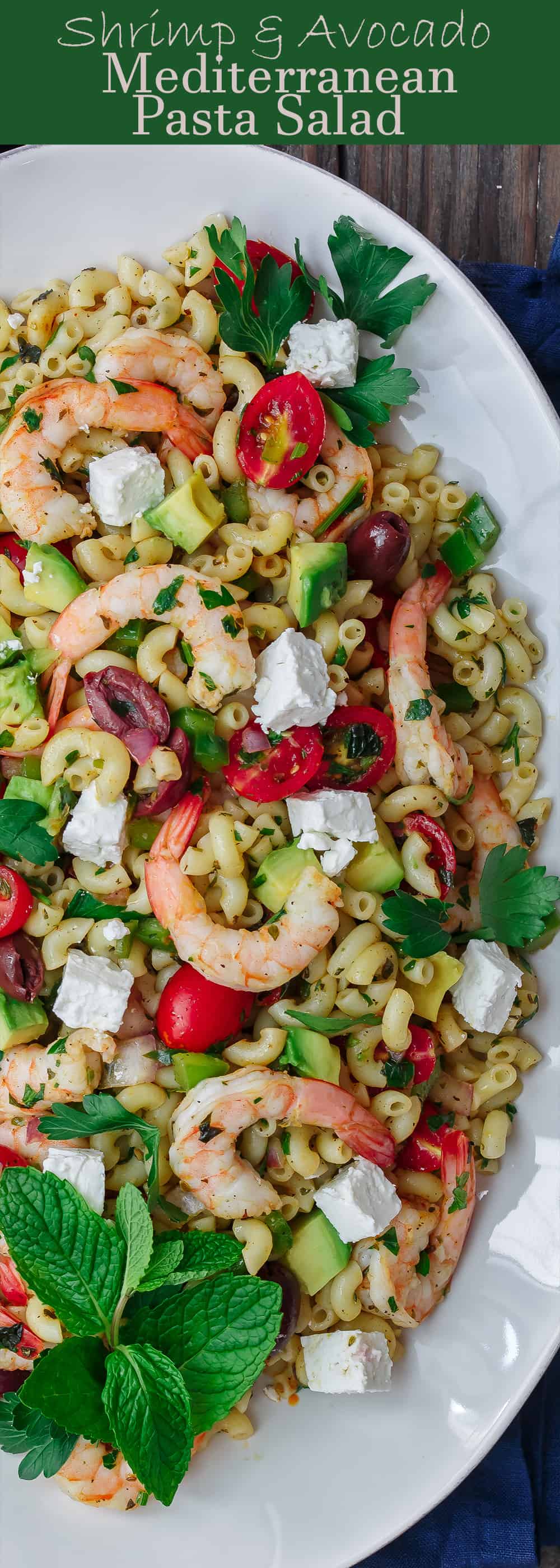 Mediterranean Pasta Salad | The Mediterranean Dish. Easy shrimp and avocado Mediterranean pasta salad. A light and zesty Mediterranean dressing, and tons of fresh herbs, chopped veggies, olives and more, take this shrimp pasta salad to a new level of delicious! See the full recipe on TheMediterraneanDish.com. #pastasalad #mediterraneanrecipe #mediterraneandiet #shrimppastasalad