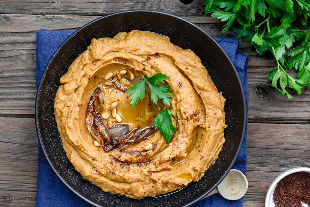 Bean Dip with Roasted Acorn Squash garnished with fresh parsley