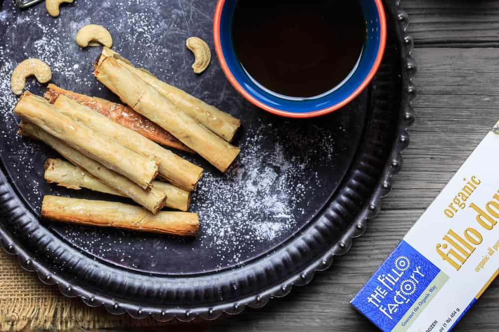 Baklava Rolls with cashew filling served with extra gaze on the size