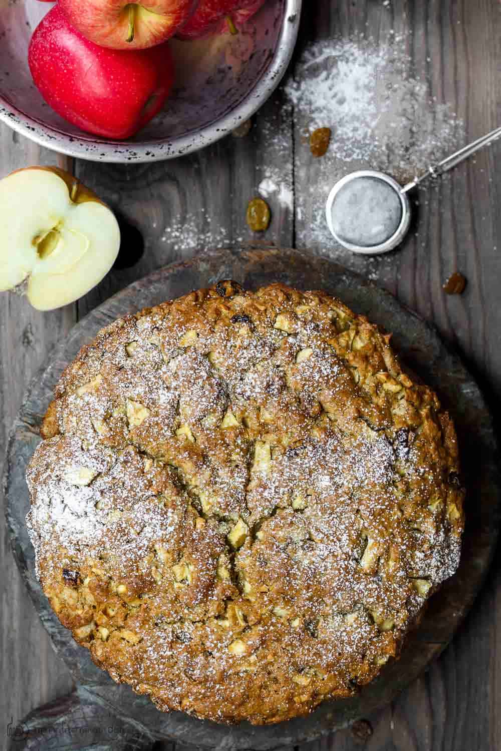 Apple Olive Oil cake whole. A dusting of sugar on top