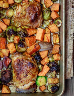 Sheet Pan Paprika Chicken and Vegetables | The Mediterranean Dish. This paprika chicken is never a hard sell at my house! Easy, flavor-packed sheet pan chicken with brussels sprouts and sweet potatoes. A comforting and healthy recipe for any night of the week! See the full recipe on TheMediterraneanDish.com. #mediterraneanrecipe #mediterraneandiet #paprikachicken #chicken #sheetpandinners #chickendinner #sheetpanchicken