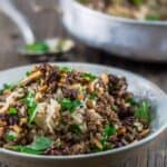 Lebanese Rice (Hashweh) | The Mediterranean Dish. Easy, flavorful loaded Lebanese Rice with ground beef, toasted nuts, raisins and sweet, earthy spices. Makes the perfect side dish or dinner bowl. Think also gluten free stuffing! #rice #lebaneserice #middleeasternrice #lebaneserecipe #mediterraneanrecipe