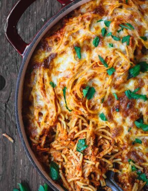 Baked Spaghetti Recipe | The Mediterranean Dish! A hearty baked spaghetti casserole with a lighter cheese mixture and the BEST homemade spaghetti sauce. Recipe on TheMediterraneanDish.com #spaghetti #bakedspaghetti #pasta #casserole