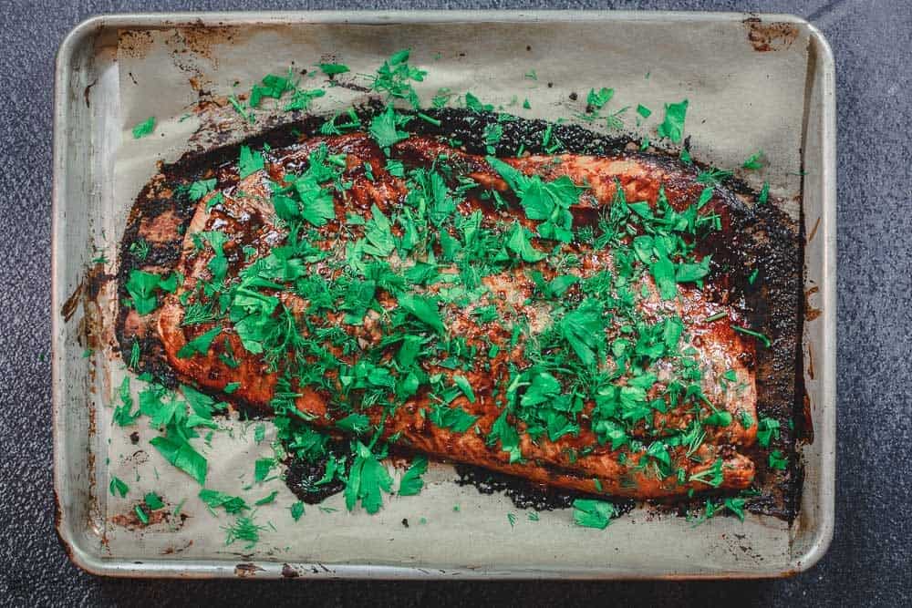 Baking sheet with baked Salmon ready to be served