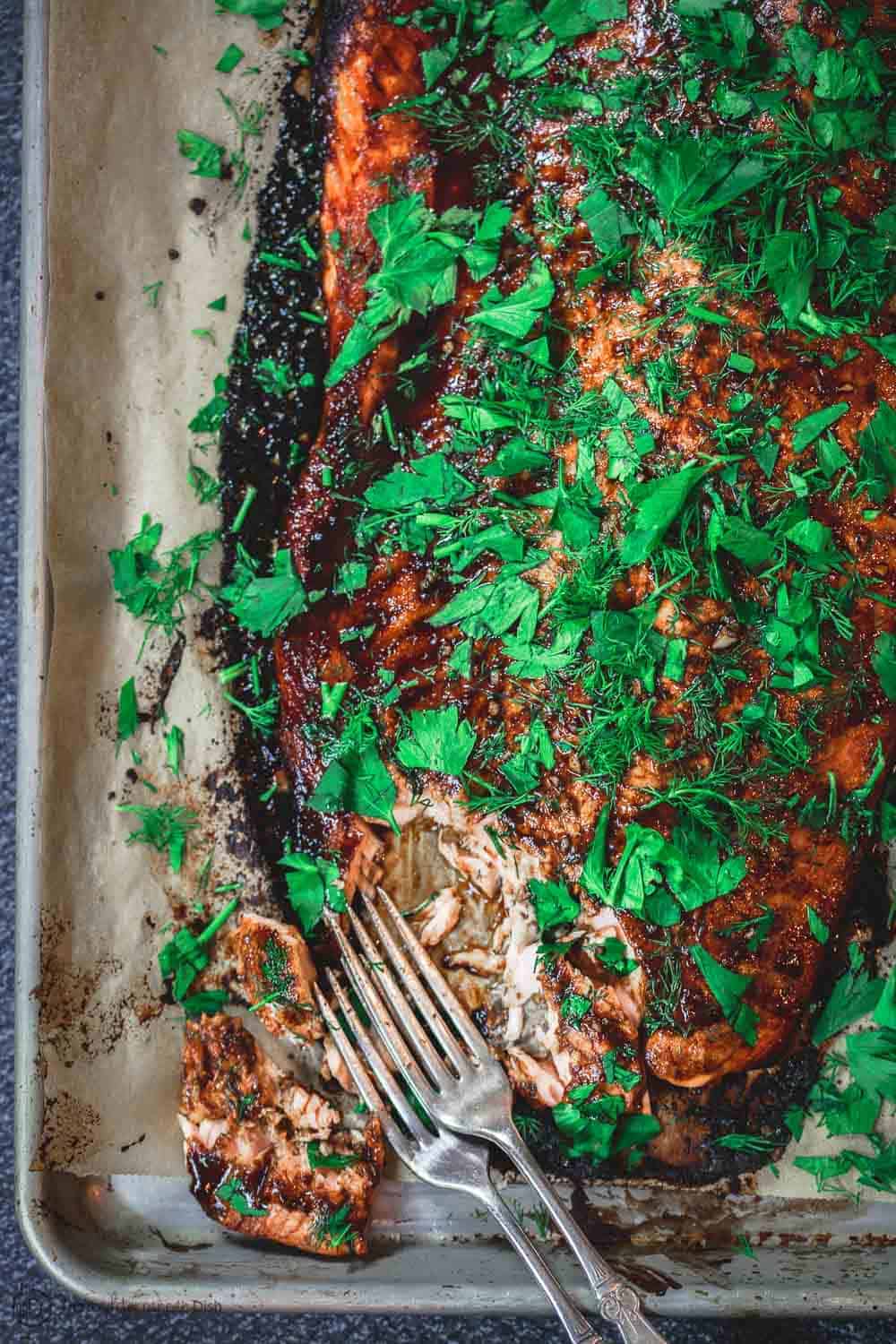 Salmon covered with Garlic-Balsamic Glaze and fresh herbs