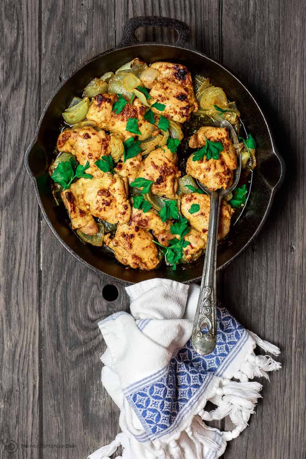 Skillet containing chicken with a Garlic Dijon sauce