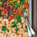 Baked shrimp on a sheet pan served Mediterranean style