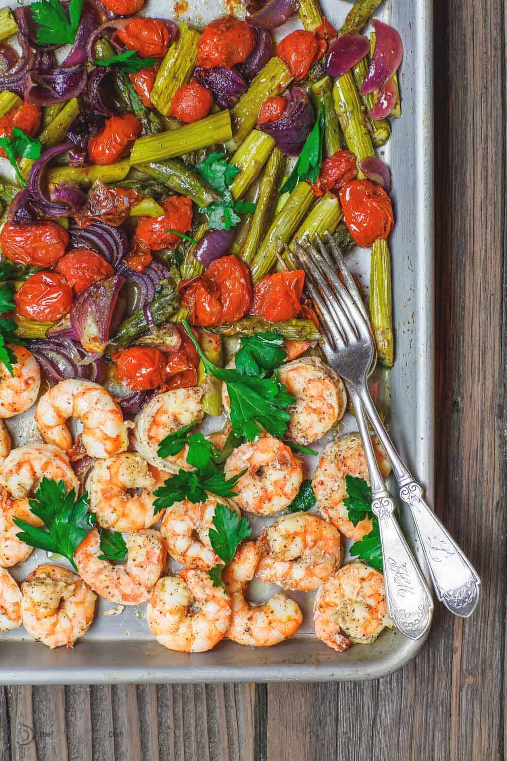 Baked shrimp on a sheet pan served Mediterranean style