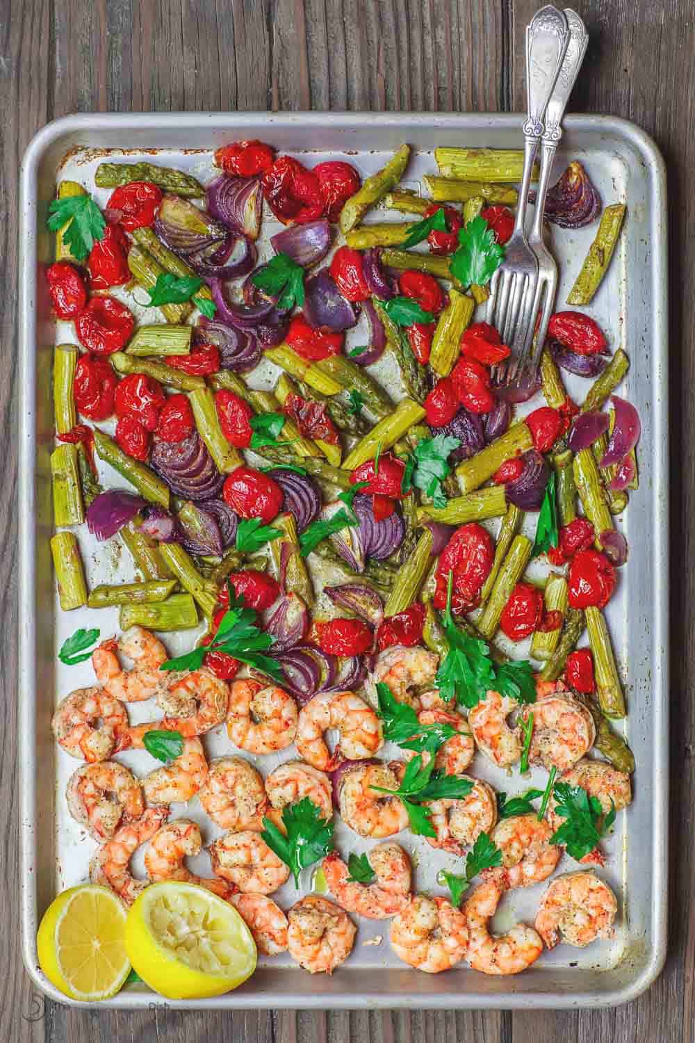 Baked shrimp on a sheet pan served Mediterranean style