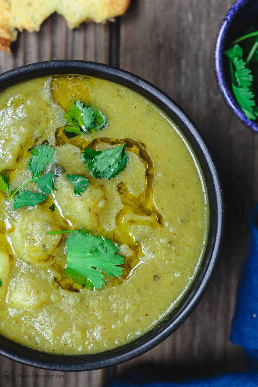 Potato Leek Soup garnished with fresh cilantro