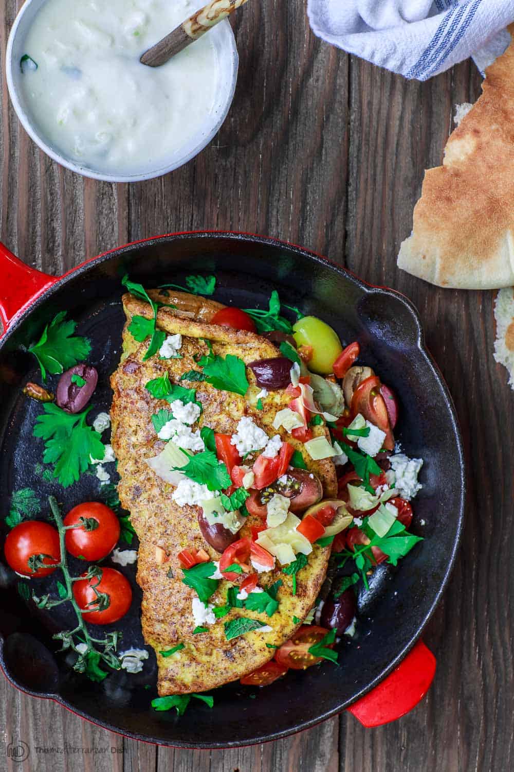 Mediterranean Omelette served with a side of pita bread