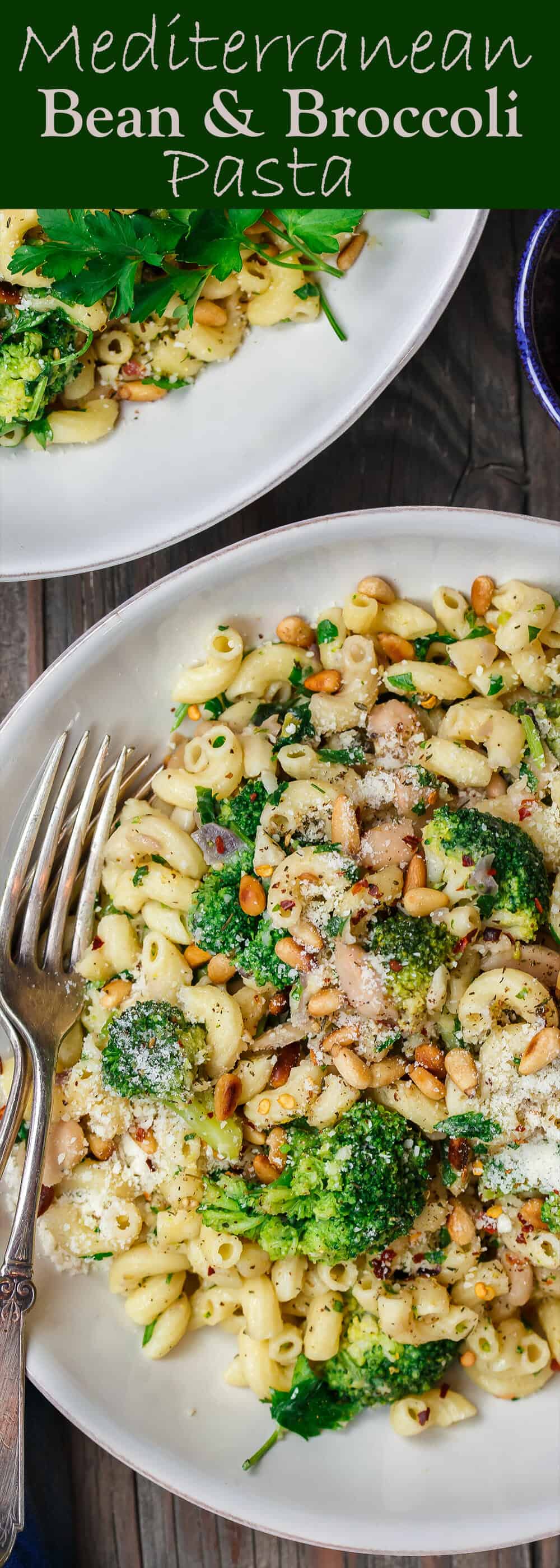 Mediterranean Bean and Broccoli Pasta | The Mediterranean Dish. Simple, hearty Mediterranean bean and broccoli pasta. Tossed in olive oil, fresh parsley and favorite spices. A sprinkle of grated Parmesan and some toasted pine nuts seal the deal! See it on TheMediterraneanDish.com #pasta #pastadinner #mediterraneandiet #healthyrecipes #comfortfood #onepotpasta #onepot