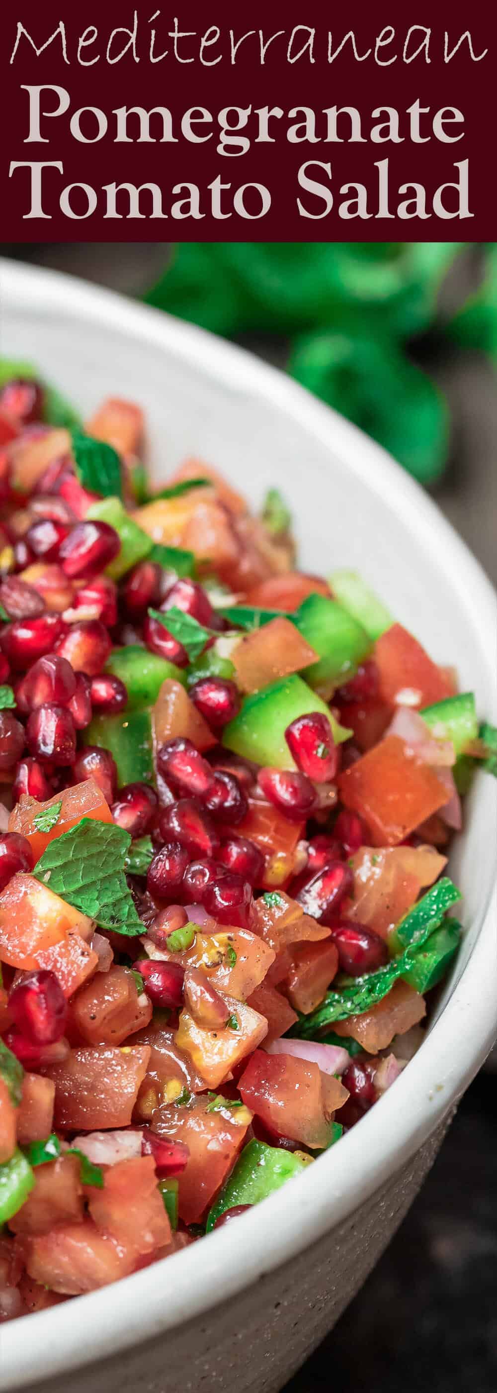 Mediterranean Pomegranate Tomato Salad | The Mediterranean Dish. This Mediterranean salad uses so few ingredients. So bright and flavor-packed! Tangy pomegranates and sunny sweet tomatoes are the perfect combination, with fresh mint and shallots! And the dressing is amazing! From TheMediterraneanDish.com