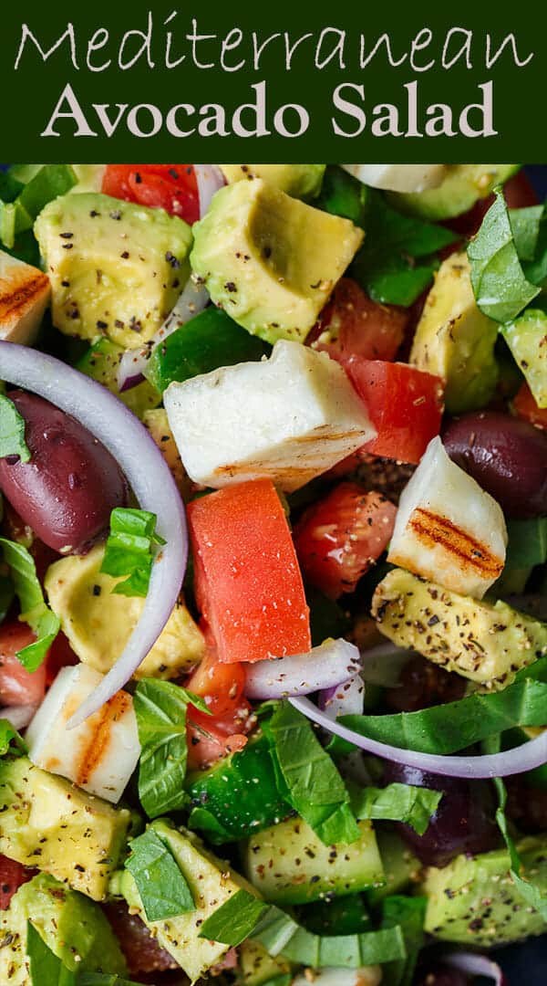 Simple Mediterranean Avocado Salad | The Mediterranean Dish. The BEST avocado salad, prepared Mediterranean style with tomatoes, cucumbers and a the perfect garlic vinaigrette! Use grilled halloumi cheese for croutons, or leave them out for a vegan option. #avocado #avocadosalad #mediterraneandiet #mediterraneanfood #salad #avocados #vegetarianrecipes #glutenfree