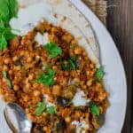 Greek Style Braised Eggplant Recipe | The Mediterranean Dish.All star braised eggplant recipe, prepared Greek style! Eggplants cooked to velvety tender perfection with chickpeas and tomato with aromatics and a few awesome spices. A perfectly satisfying meatless dinner or side dish. Vegan. Gluten Free. #meatless #eggplantrecipe #chickpearecipe #mediterraneandiet #greekfood #veganrecipe #glutenfreerecipe #chickpeas #eggplant #meatlessdinner #onepot #easyrecipes #healthyrecipe #vegetarian