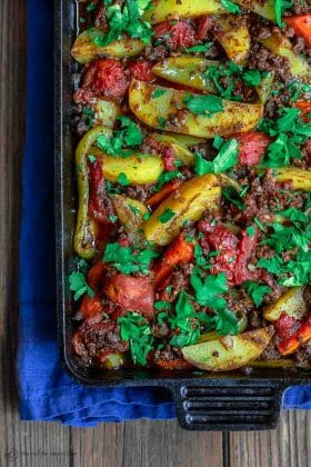 Easy Potato Casserole Recipe | The Mediterranean Dish. An all-star potato casserole with an Egyptian twist. Healthier, gluten free, and dairy free potato casserole with carrots, green peppers and a secret sauce. The flavor combination will surprise you in a good way. Recipe from TheMediterraneanDish.com #potatoes #potatorecipe #mediterraneandiet #potatocasserole #glutenfreerecipe #dairyfree
