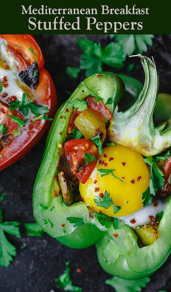 Easy Stuffed Peppers | The Mediterranean Dish. These stuffed peppers are filled with a gluten free and vegetarian potato hash and topped with a perfectly melty egg. Serve them for brunch or dinner, you'll love these healthy stuffed peppers, prepared Mediterranean style. See it on TheMediterraneanDish.com #stuffedpeppers #mediterraneandiet #breakfast #brunch #potatoes #potatohash #glutenfree #breakfasthash #easyrecipes #bellpeppers #healthyrecipe #vegetarian #mothersdaybrunch