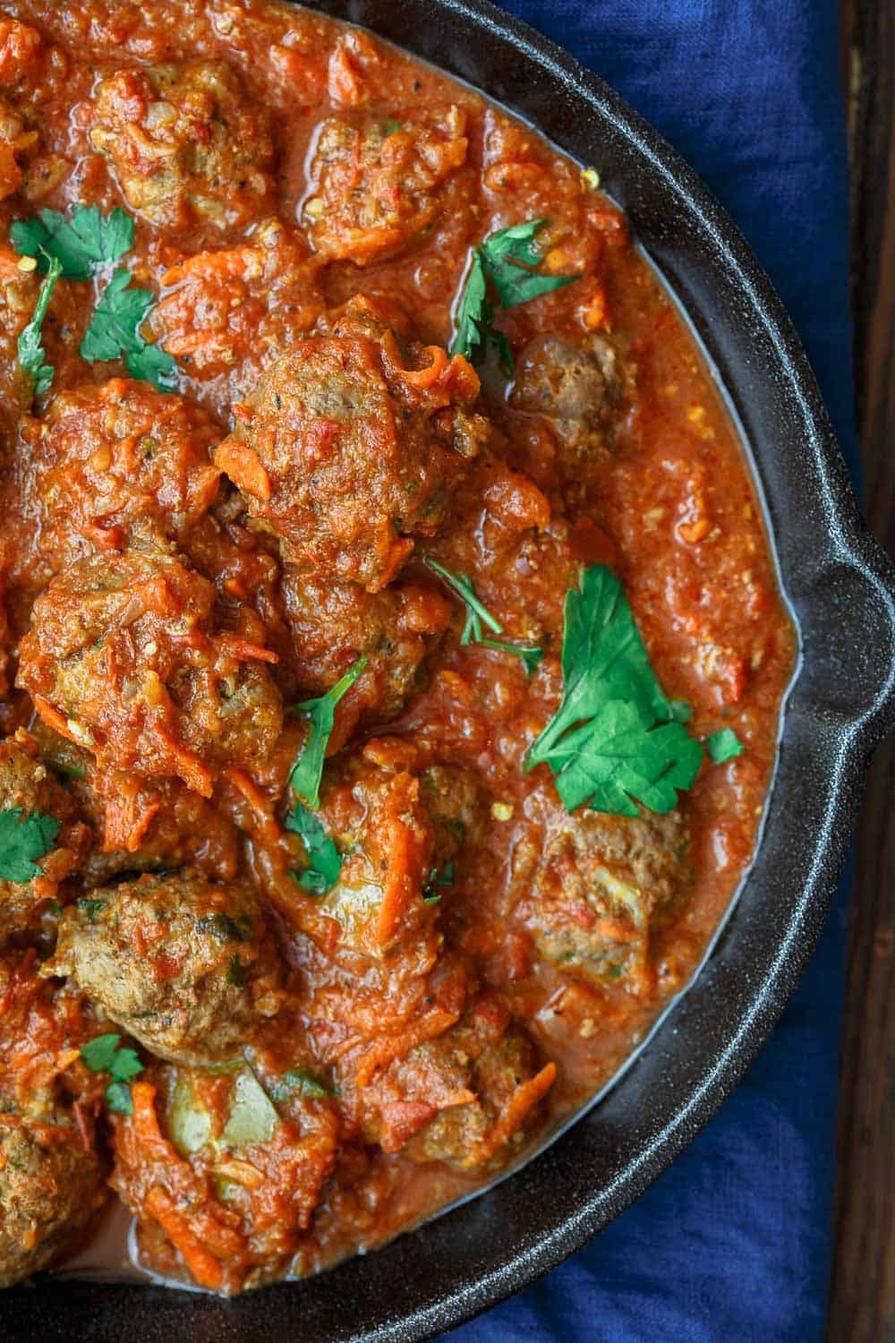 Close-up of tomato sauce with Lebanese Meatballs in a skillet