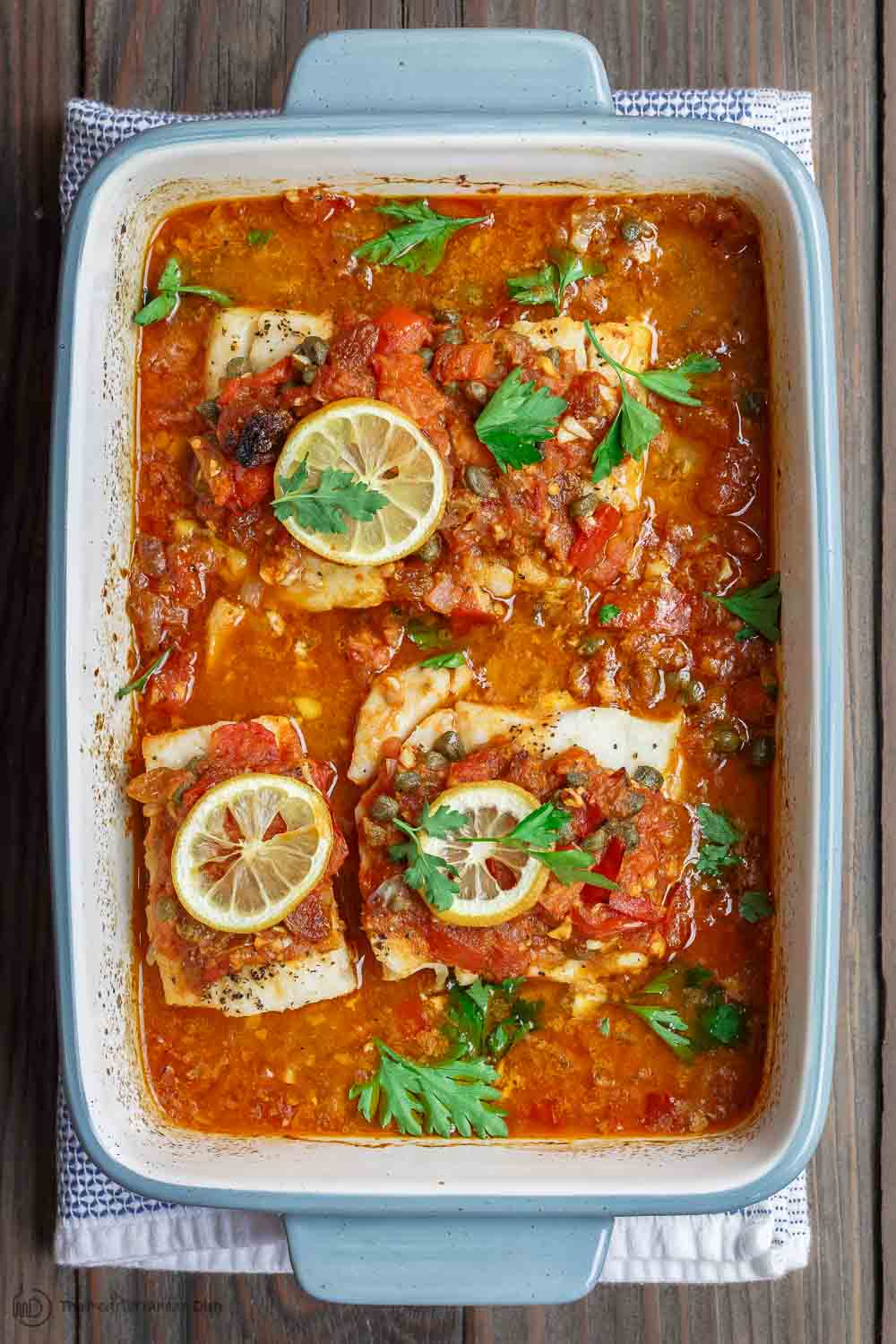 Mediterranean Baked Fish Recipe with Tomatoes, Capers, and Lemon 