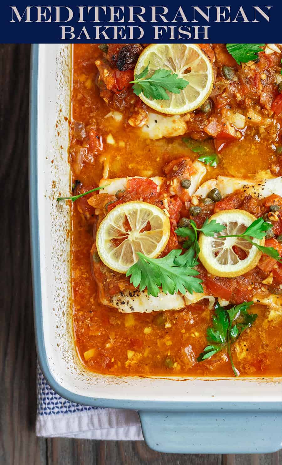 Mediterranean Baked Fish Recipe with Tomatoes and Capers | The Mediterranean Dish. Easy, bright, flavor-packed baked fish, prepared Mediterranean style with spices, tomatoes and capers. From TheMediterraneanDish.com #healthyrecipes #fishrecipe #bakedfish #cod #halibut #glutenfree #seafoodrecipe #seafood #fish #mediterraneandiet #mediterranean #easyrecipe